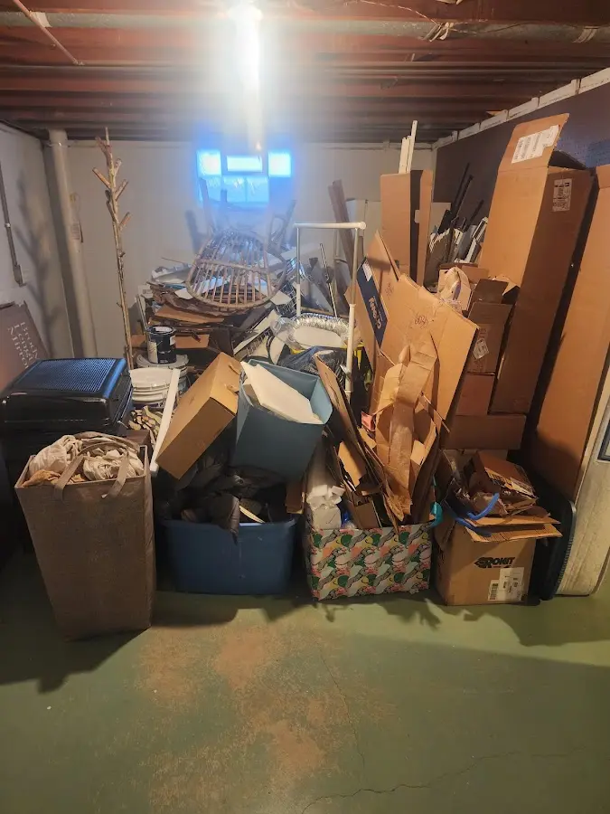 Roll-off dumpster container at job site for 2 Yard Dumpster Rental in Celebration